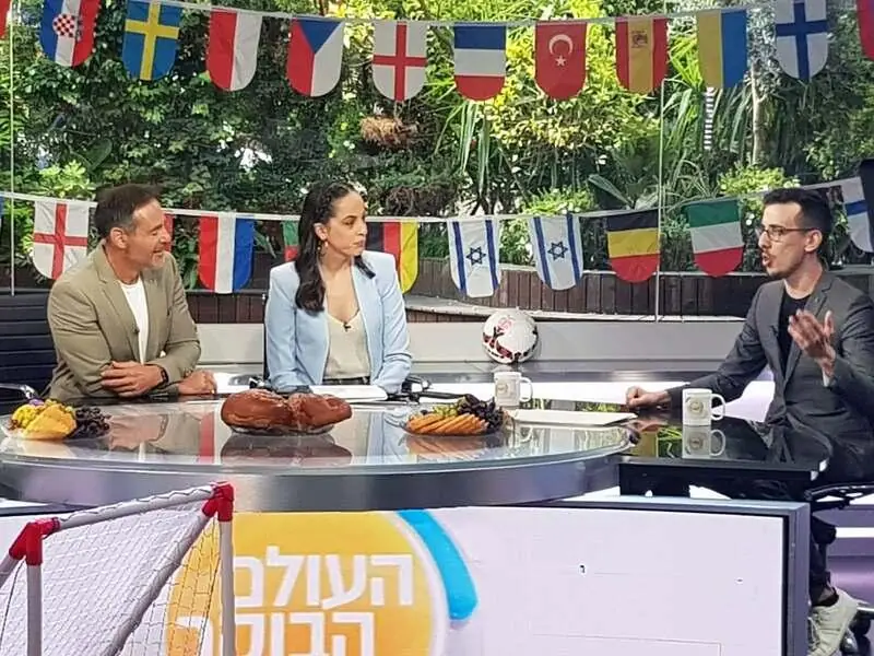 Ben Cale interviewed in a TV studio